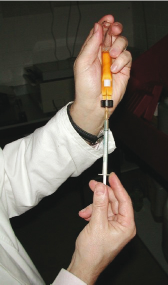 Anoxic removal of a sample from a Hungate tube